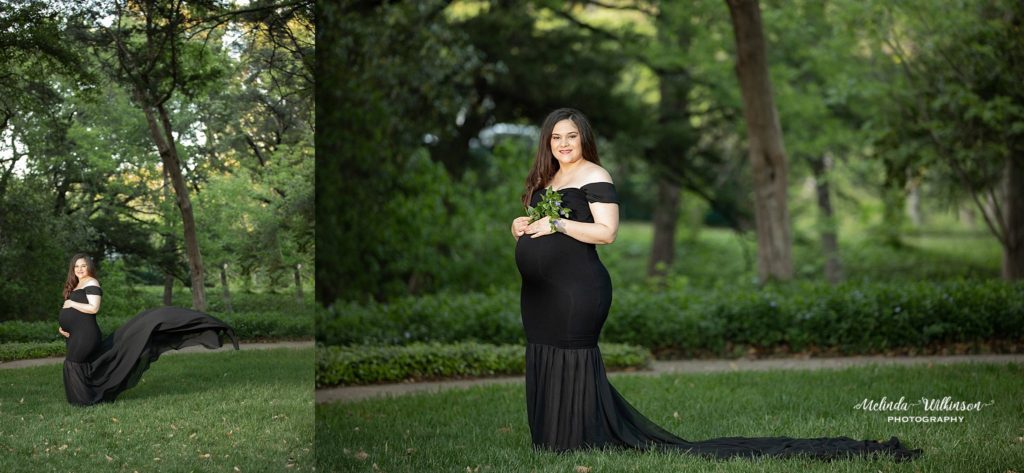 pregnant woman in a black dress with a train in a park during a maternity session